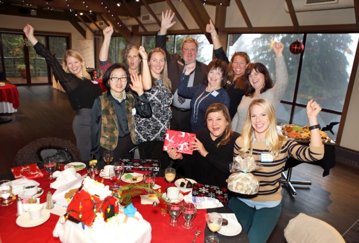 The BBOT's Women's Business Success Network attendees celebrating their first place finish in the Gingerbread House Contest